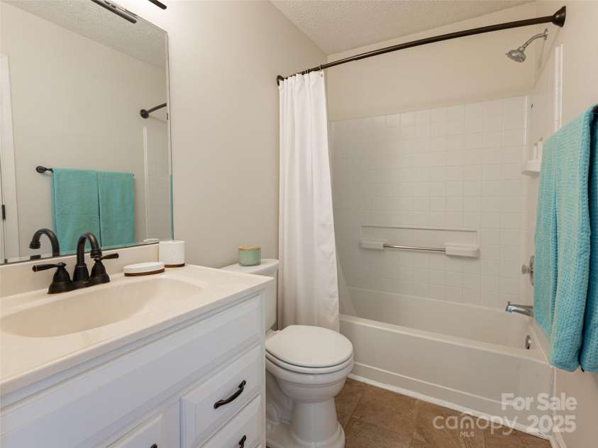 70 Wyatt Street, Asheville, NC 28803.  MLS# CAR4322963, YatesRealty ID 10553. Full Bath on Main Level with combo tub/shower
