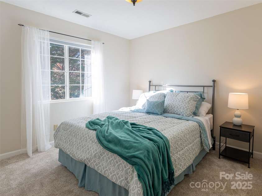70 Wyatt Street, Asheville, NC 28803.  MLS# CAR4322963, YatesRealty ID 10553. Guest Bedroom on Main Level with Large Double Window