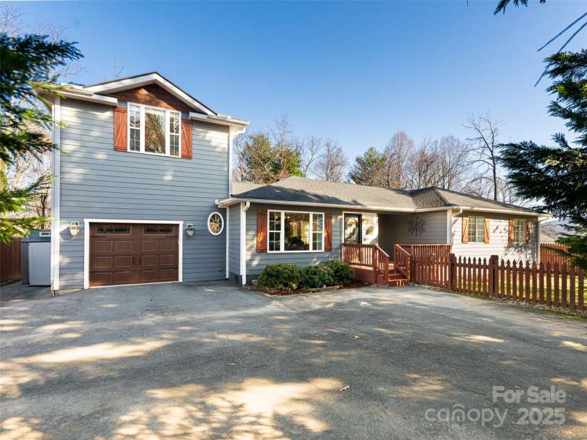 70 Wyatt Street, Asheville, NC 28803.  MLS# CAR4322963, YatesRealty ID 10553. Large area in front of house offering plenty of parking for family and guests