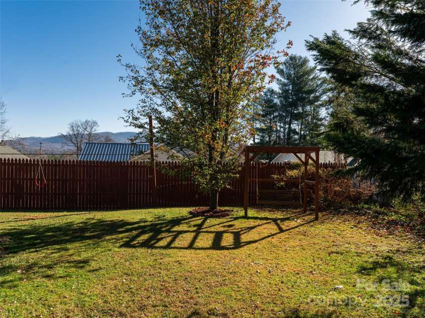 70 Wyatt Street, Asheville, NC 28803.  MLS# CAR4322963, YatesRealty ID 10553. Large fenced-in back yard with mountain views
