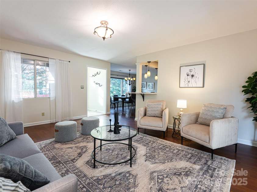 70 Wyatt Street, Asheville, NC 28803.  MLS# CAR4322963, YatesRealty ID 10553. Light, bright natural light fills the open area living room