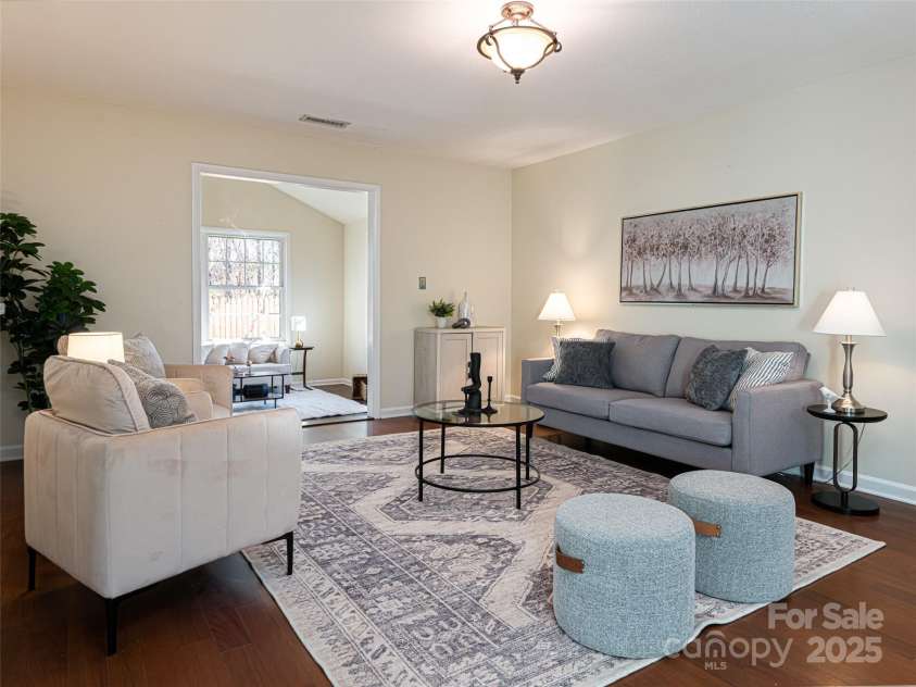 70 Wyatt Street, Asheville, NC 28803.  MLS# CAR4322963, YatesRealty ID 10553. Living Room leading to intimate family room