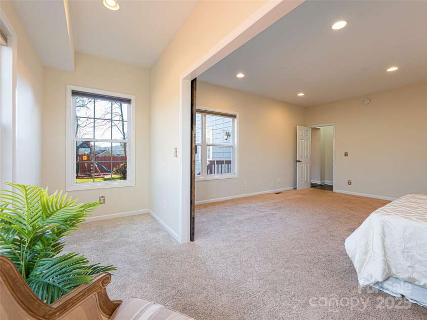 70 Wyatt Street, Asheville, NC 28803.  MLS# CAR4322963, YatesRealty ID 10553. Primary Bedroom #2 on Main Level overlooking backyard and mountain.