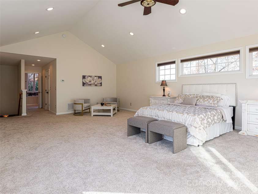 70 Wyatt Street, Asheville, NC 28803.  MLS# CAR4322963, YatesRealty ID 10553. Transom windows above the upstairs Primary Bedroom Suite allow natural light plus privacy.