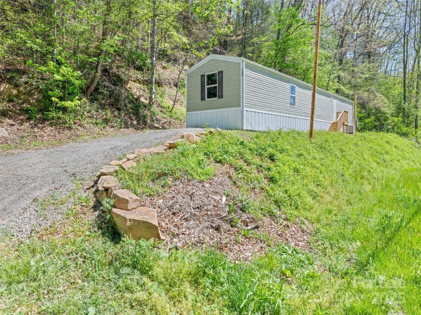 700 Cove Creek Road, Waynesville, NC 28785.  MLS# CAR4253279, YatesRealty ID 10557. 