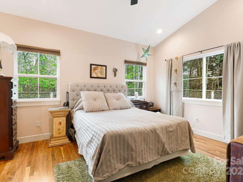 180 Moody Avenue, Candler, NC 28715.  MLS# CAR4248011, YatesRealty ID 10561. First Floor Primary Bedroom