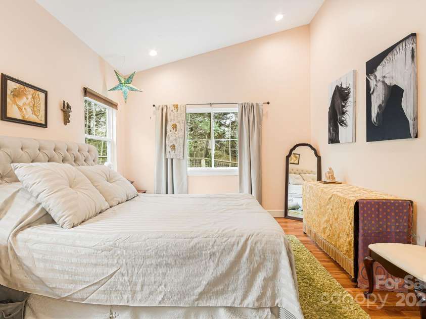 180 Moody Avenue, Candler, NC 28715.  MLS# CAR4248011, YatesRealty ID 10561. First Floor Primary Bedroom