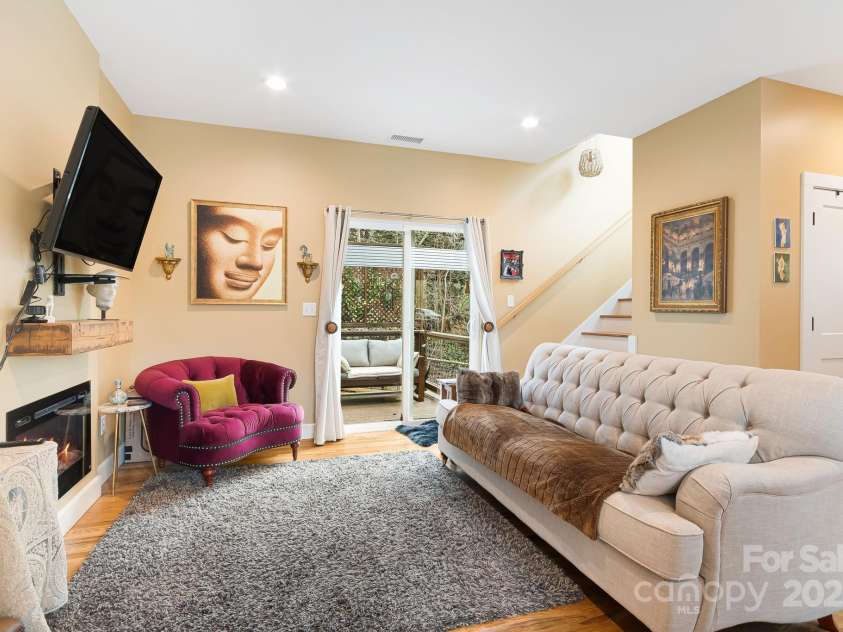 180 Moody Avenue, Candler, NC 28715.  MLS# CAR4248011, YatesRealty ID 10561. Living Room