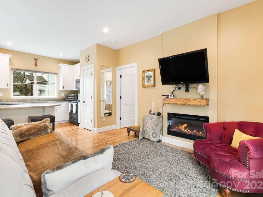 180 Moody Avenue, Candler, NC 28715.  MLS# CAR4248011, YatesRealty ID 10561. Living Room