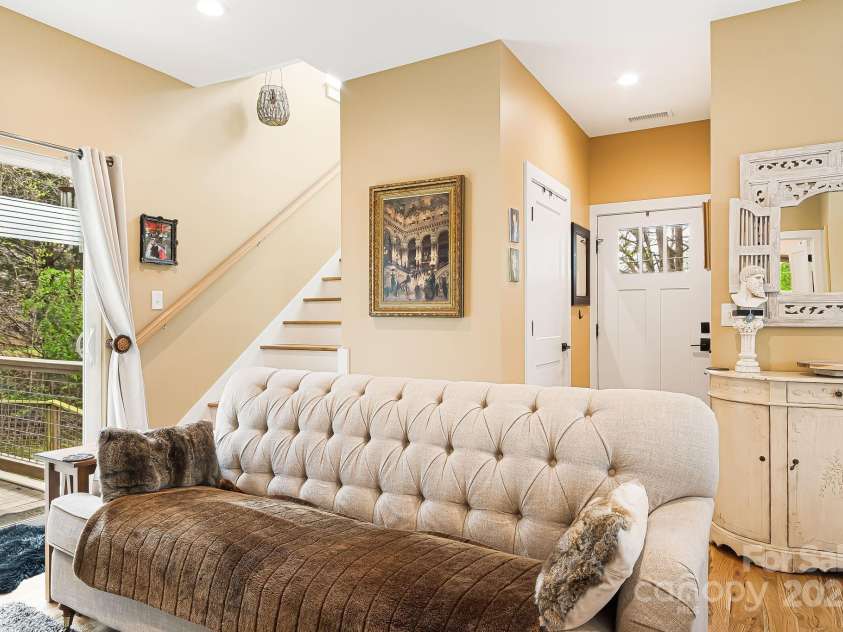 180 Moody Avenue, Candler, NC 28715.  MLS# CAR4248011, YatesRealty ID 10561. Living Room