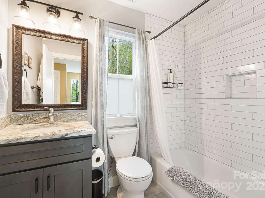180 Moody Avenue, Candler, NC 28715.  MLS# CAR4248011, YatesRealty ID 10561. Upper Level Guest Full Bath