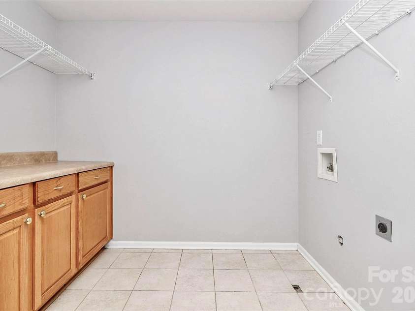 3005 Council Fire Circle, Indian Trail, NC 28079.  MLS# CAR4329437, YatesRealty ID 10561. Laundry Room 