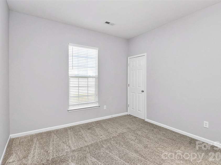 3005 Council Fire Circle, Indian Trail, NC 28079.  MLS# CAR4329437, YatesRealty ID 10561. Main Floor Bedroom