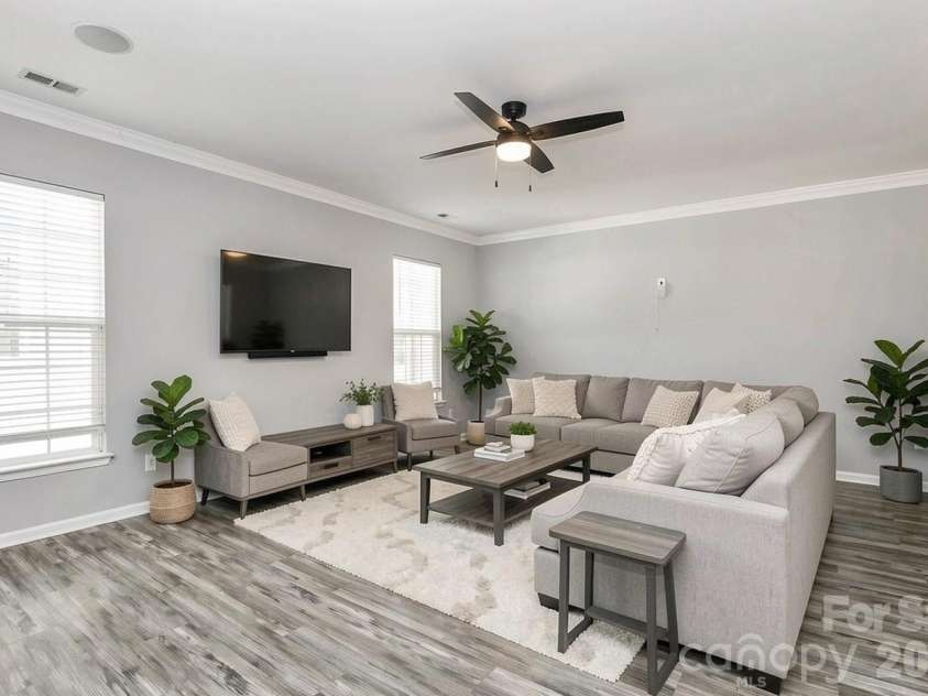 3005 Council Fire Circle, Indian Trail, NC 28079.  MLS# CAR4329437, YatesRealty ID 10561. Virtually Staged Living Room