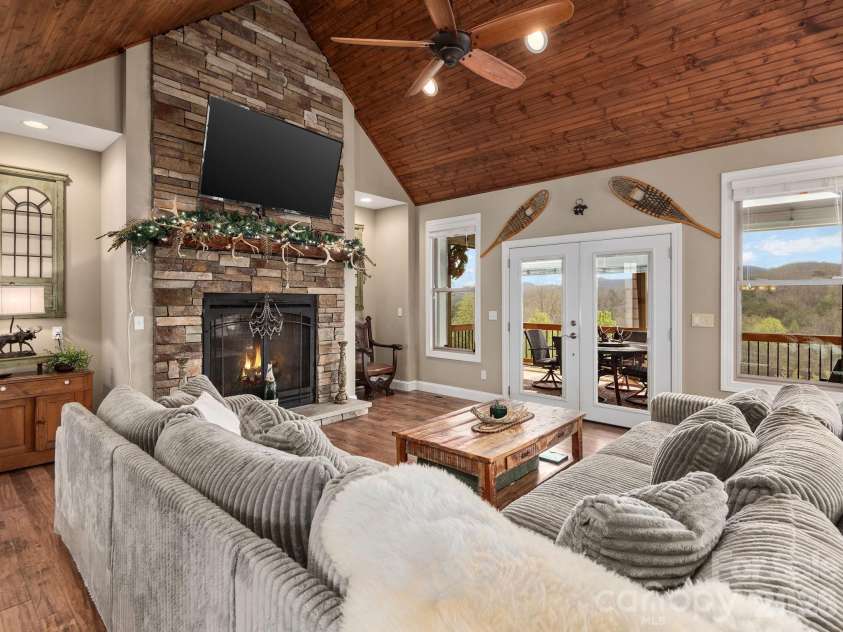 193 Youngs Cove Road, Candler, NC 28715.  MLS# CAR4363797, YatesRealty ID 10564. Beautiful fireplace 