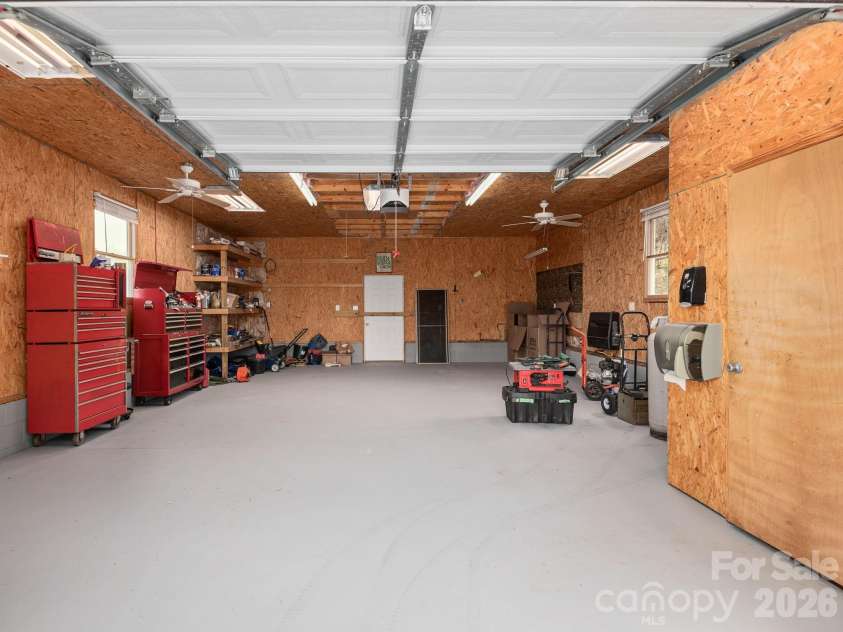 193 Youngs Cove Road, Candler, NC 28715.  MLS# CAR4363797, YatesRealty ID 10564. Workshop/ 2nd garage w bathroom