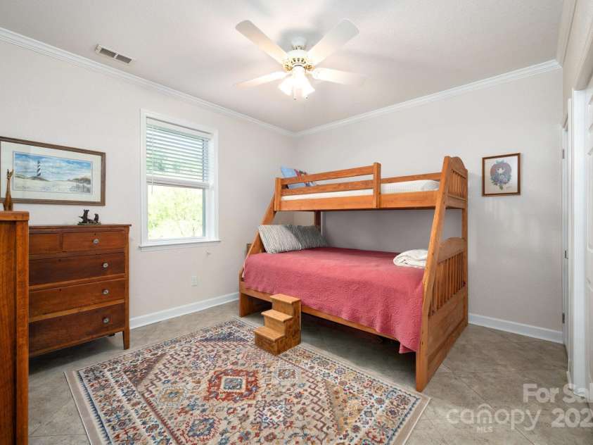 85 Laurel Cove Road, Candler, NC 28715.  MLS# CAR4251695, YatesRealty ID 10564. 2nd Bedroom on Main Level