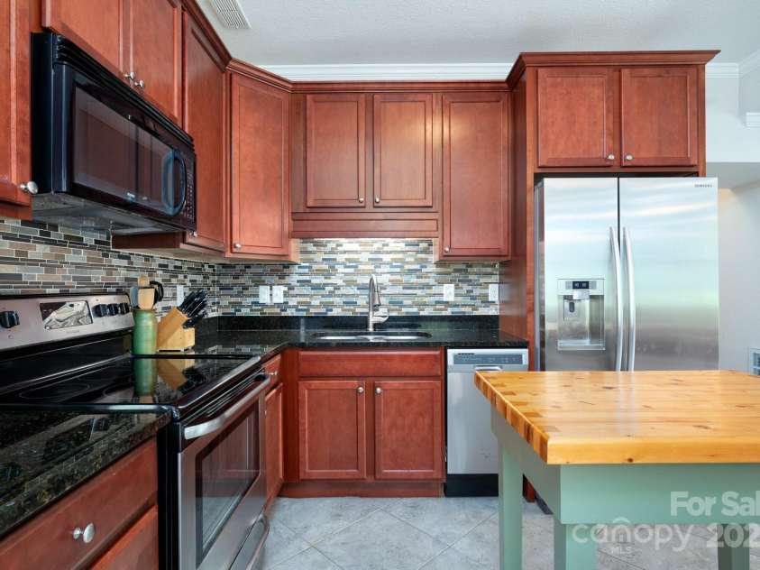 85 Laurel Cove Road, Candler, NC 28715.  MLS# CAR4251695, YatesRealty ID 10564. 2nd Living Quarters has High Quality Finishes