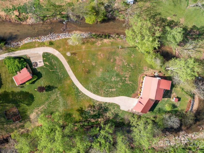 85 Laurel Cove Road, Candler, NC 28715.  MLS# CAR4251695, YatesRealty ID 10564. A View from Above...Home Plus TWO Additional Building Lots