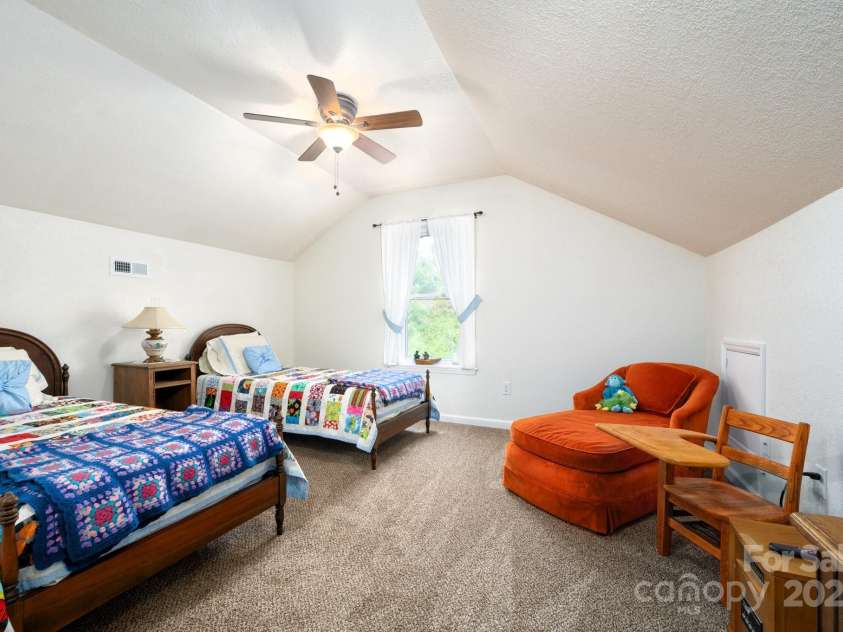 85 Laurel Cove Road, Candler, NC 28715.  MLS# CAR4251695, YatesRealty ID 10564. Additional Bedroom on 3rd Floor