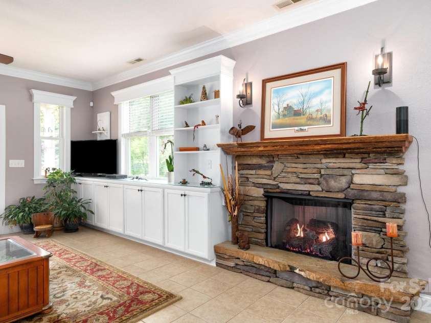 85 Laurel Cove Road, Candler, NC 28715.  MLS# CAR4251695, YatesRealty ID 10564. Crown Molding and Built-ins Abound