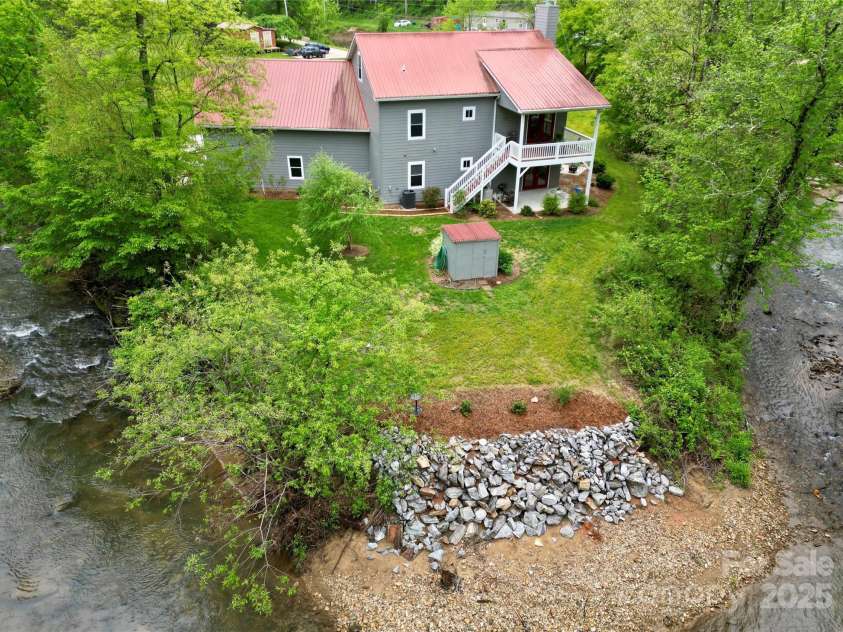 85 Laurel Cove Road, Candler, NC 28715.  MLS# CAR4251695, YatesRealty ID 10564. Enjoy the Tranquility of Being in the Bend of South Hominy Creek