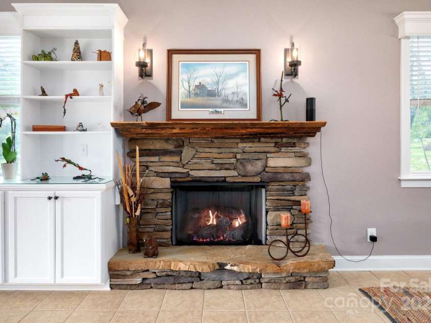 85 Laurel Cove Road, Candler, NC 28715.  MLS# CAR4251695, YatesRealty ID 10564. Heat Producing Gas Fireplace