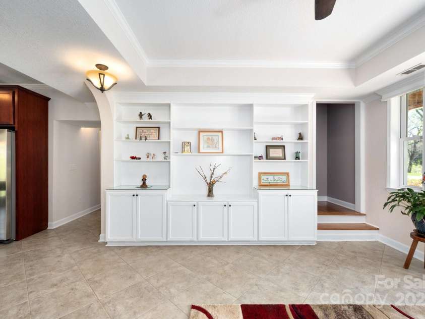 85 Laurel Cove Road, Candler, NC 28715.  MLS# CAR4251695, YatesRealty ID 10564. Lovely Built-ins Around Every Turn