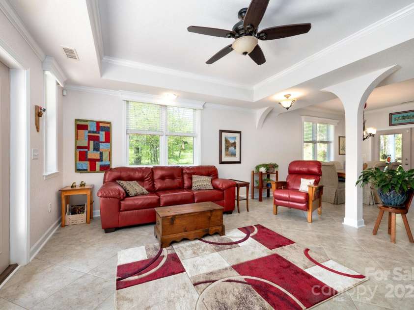 85 Laurel Cove Road, Candler, NC 28715.  MLS# CAR4251695, YatesRealty ID 10564. Main Level has Full Kitchen and Separate Metering for 2nd Living Quarters or Rentable Space