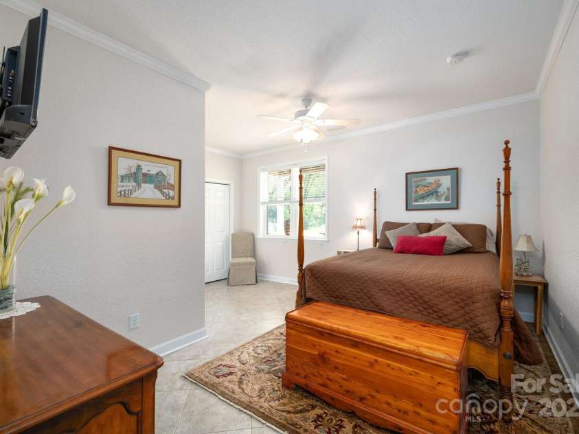 85 Laurel Cove Road, Candler, NC 28715.  MLS# CAR4251695, YatesRealty ID 10564. One of Two Primary Suites (this one's on the main)