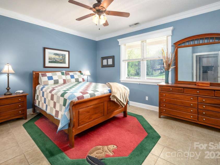 85 Laurel Cove Road, Candler, NC 28715.  MLS# CAR4251695, YatesRealty ID 10564. Primary Bedroom on Upper Level