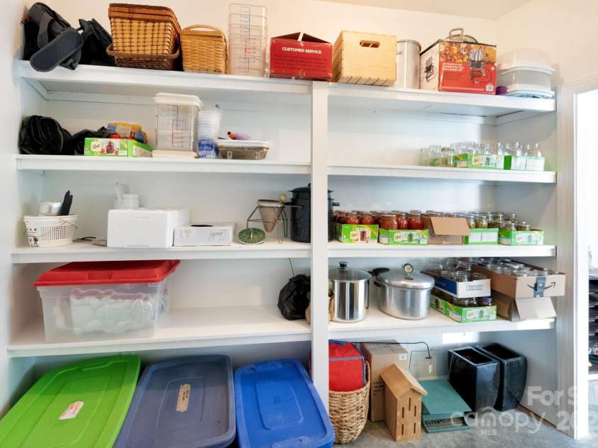 85 Laurel Cove Road, Candler, NC 28715.  MLS# CAR4251695, YatesRealty ID 10564. There's Even Built-ins in Here!