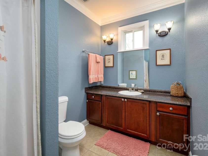 85 Laurel Cove Road, Candler, NC 28715.  MLS# CAR4251695, YatesRealty ID 10564. Upper Level Full Bathroom