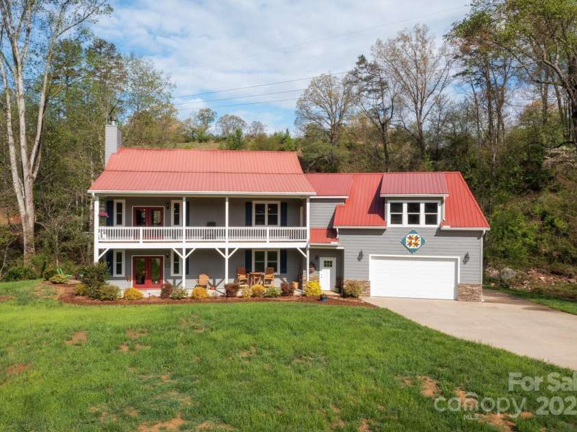 85 Laurel Cove Road, Candler, NC 28715.  MLS# CAR4251695, YatesRealty ID 10564. Visit 85 Laurel Creek Today!