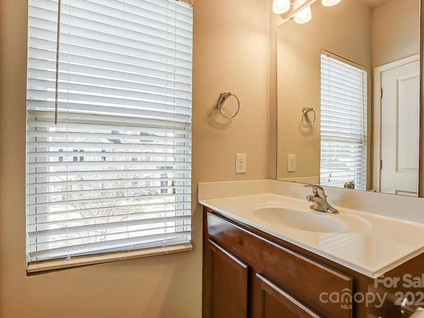 104 Canyon Ridge Drive, Mount Holly, NC 28120.  MLS# CAR4219703, YatesRealty ID 10574. 2nd bath vanity
