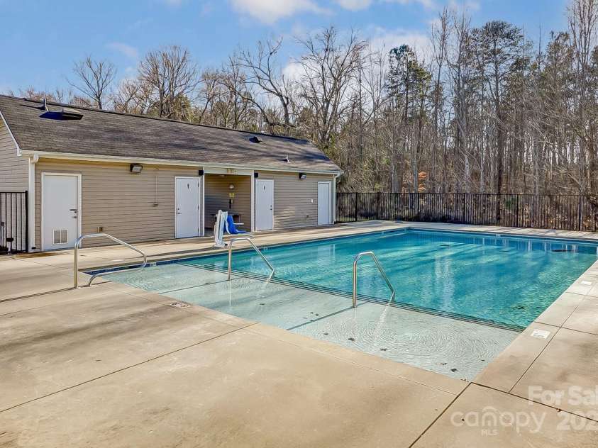 104 Canyon Ridge Drive, Mount Holly, NC 28120.  MLS# CAR4219703, YatesRealty ID 10574. Pool