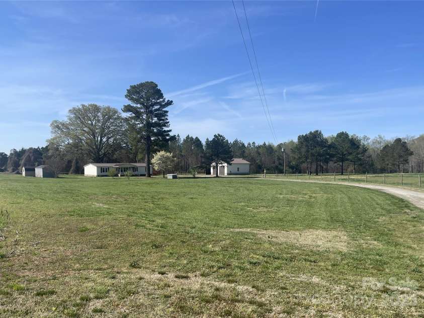 485 Harper Miller Drive, Cleveland, NC 27013.  MLS# CAR4231212, YatesRealty ID 10582. PRIVATE SETTING