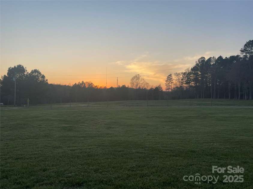 485 Harper Miller Drive, Cleveland, NC 27013.  MLS# CAR4231212, YatesRealty ID 10582. SUNSET OVER THE PASTURE