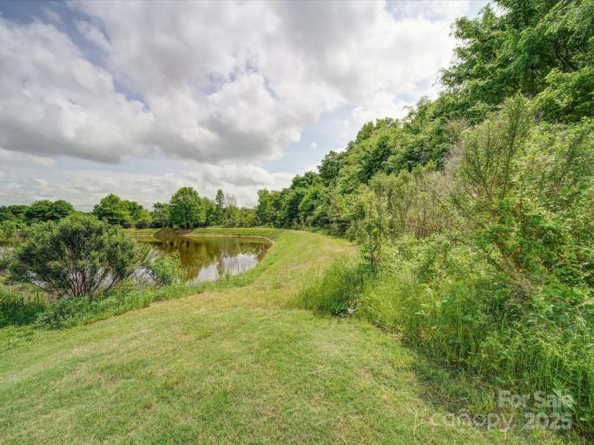 4008 Houndscroft Road, Indian Trail, NC 28079.  MLS# CAR4251235, YatesRealty ID 10583. Back Yard access to pond