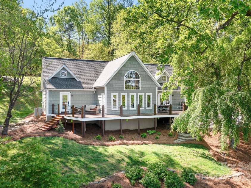 234 Winding Shore Road, Troutman, NC 28166.  MLS# CAR4245762, YatesRealty ID 10588. A full view of the back of the home. You can see how much character and charm this home has.