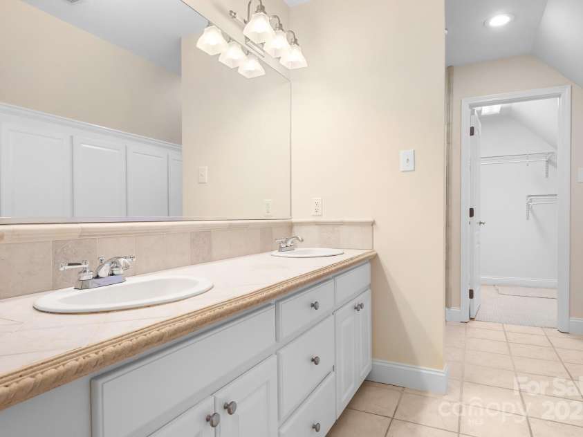 234 Winding Shore Road, Troutman, NC 28166.  MLS# CAR4245762, YatesRealty ID 10588. A large, dual bowl vanity to handle all your needs.