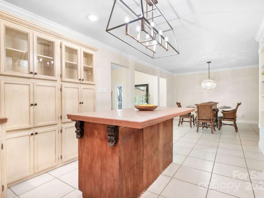 234 Winding Shore Road, Troutman, NC 28166.  MLS# CAR4245762, YatesRealty ID 10588. The center island can hold for stools comfortably.