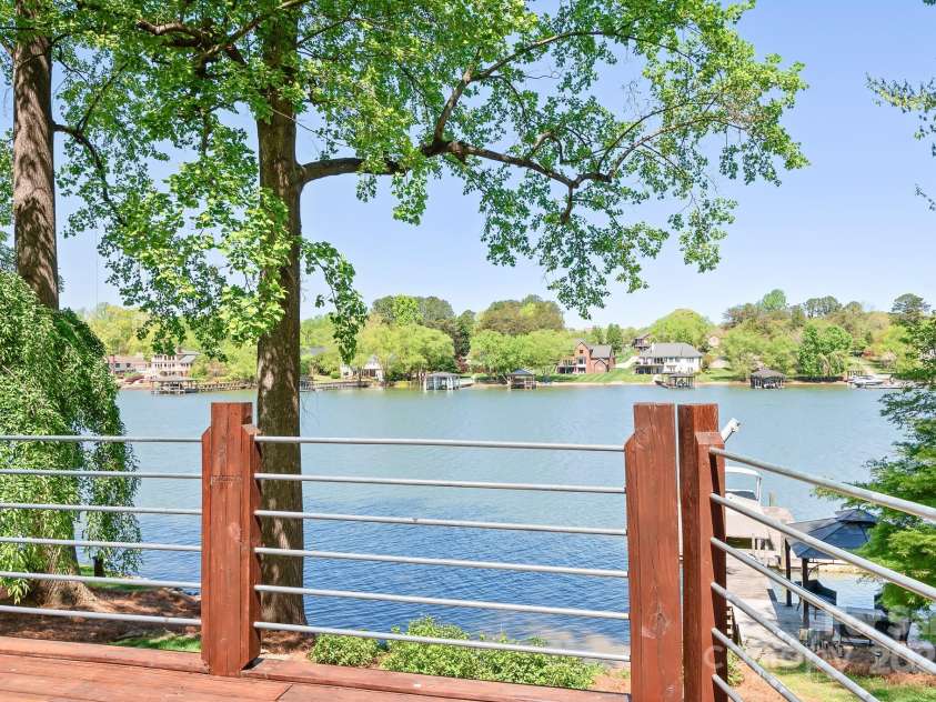 234 Winding Shore Road, Troutman, NC 28166.  MLS# CAR4245762, YatesRealty ID 10588. Views from the deck overlooking the wide cove.