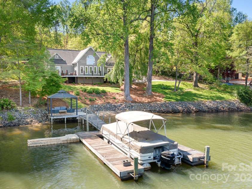 234 Winding Shore Road, Troutman, NC 28166.  MLS# CAR4245762, YatesRealty ID 10588. Welcome to 234 Winding Shore. Your new waterfront retreat on Lake Norman.