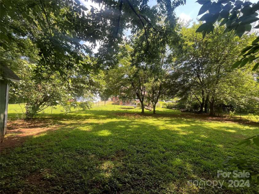 1318 Enderly Road, Charlotte, NC 28208.  MLS# CAR4143612, YatesRealty ID 106. Area in rear of home