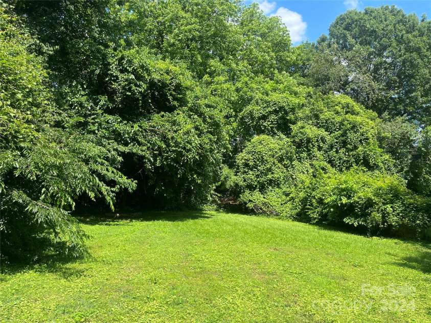 1318 Enderly Road, Charlotte, NC 28208.  MLS# CAR4143612, YatesRealty ID 106. Rear part of the parcel towards Rogers St and Tuckaseegee Road