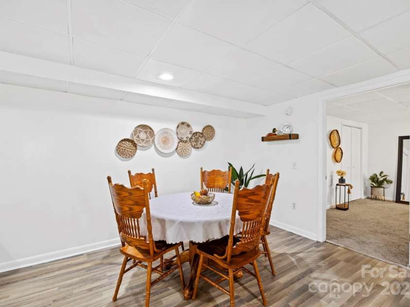 228 White Oak Road, Waynesville, NC 28785.  MLS# CAR4215162, YatesRealty ID 10603. 2nd dining area downstairs