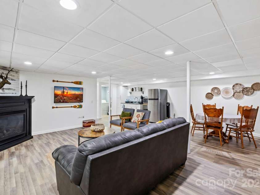 228 White Oak Road, Waynesville, NC 28785.  MLS# CAR4215162, YatesRealty ID 10603. 2nd living area downstairs