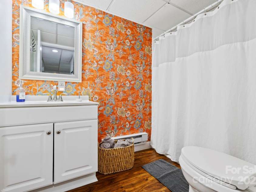 228 White Oak Road, Waynesville, NC 28785.  MLS# CAR4215162, YatesRealty ID 10603. Bathroom downstairs