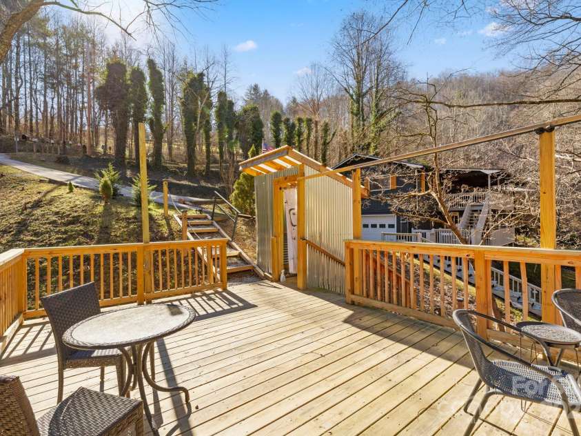 228 White Oak Road, Waynesville, NC 28785.  MLS# CAR4215162, YatesRealty ID 10603. Free standing entertaining area overlooking creek